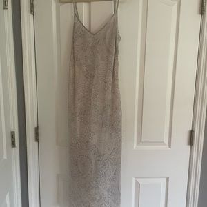 Silk slip/ Versatile worn by itself /Layered it’s gorgeous. Tags on never worn